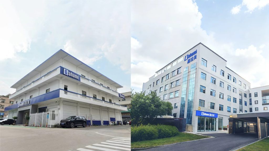 Two Gahumi factory buildings with company signage